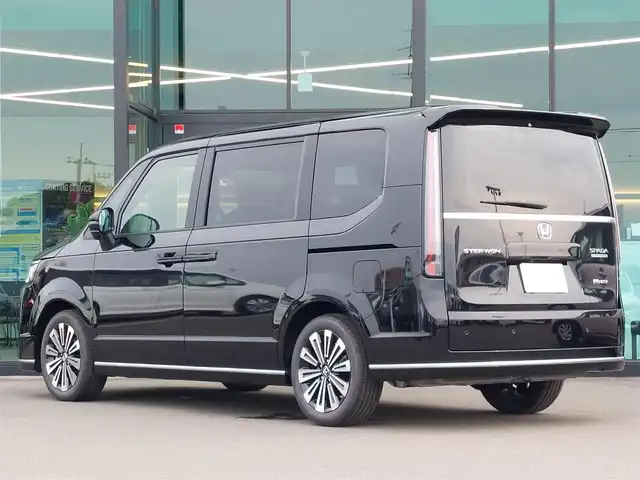 ホンダ ステップワゴン スパーダ eHEV プレミアムライン 東京都 2025(令7)年 0.1万km クリスタルブラックパール 純正11.4インチナビ/マルチビューカメラシステム/フルセグ/両側パワースライドドア/電動リアゲート/ハーフレザーシート/シートヒーター/オットマン/LEDヘッドライト/パドルシフト/衝突軽減システム/レーンキープアシスト/ブラインドスポットモニター/レーダークルーズコントロール/スマートキー