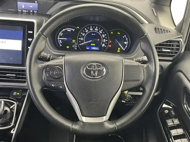 トヨタ ヴォクシー ハイブリッド ZS 煌Ⅲ 愛知県 2020(令2)年 4.4万km イナズマスパーキングブラックガラスフレーク 純正１０型ナビ　フルセグＴＶ　Ｂｌｕｅｔｏｏｔｈ　ハーフレザーシート　シートヒーター　ＥＴＣ　両側パワースライドドア　セーフティセンス　衝突軽減装置　クルーズコントロール　ドライブレコーダー　禁煙車