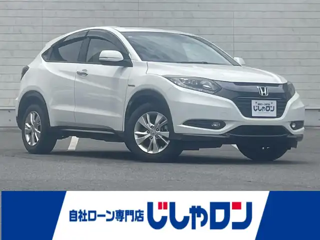 ホンダ ヴェゼル ハイブリッド X 岡山県 2014(平26)年 9.2万km ホワイトオーキッドパール (株)IDOMが運営する【じしゃロン岡山店】の自社ローン専用車両になります。こちらは現金またはオートローンご利用時の価格です。自社ローンご希望の方は別途その旨お申付け下さい/純正7インチナビ/Bluetooth/ワンセグ/バックカメラ/ビルトインETC/パドルシフト/クルーズコントロール