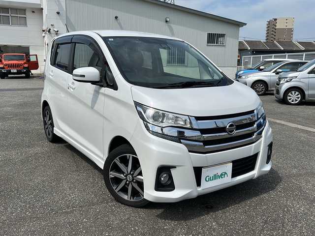 日産 デイズ ハイウェイスターG ターボ 富山県 2015(平27)年 4.5万km ホワイトパール スマートキー（２本）/4WD/衝突安全ブレーキ/全周囲モニター/純正メモリーナビ（MC315D-W）/フルセグTV/DVD再生/Bluetooth/純正15インチAW/シートヒーター（D席）/フォグランプ/純正ドアバイザー/フロアマット/横滑り防止装置/アイドリングストップ/電動格納ウィンカーミラー/ドライブレコーダー（前）/保証書/取扱説明書/ナビ取扱説明書/ドライブレコーダー取扱説明書/点検整備記録簿