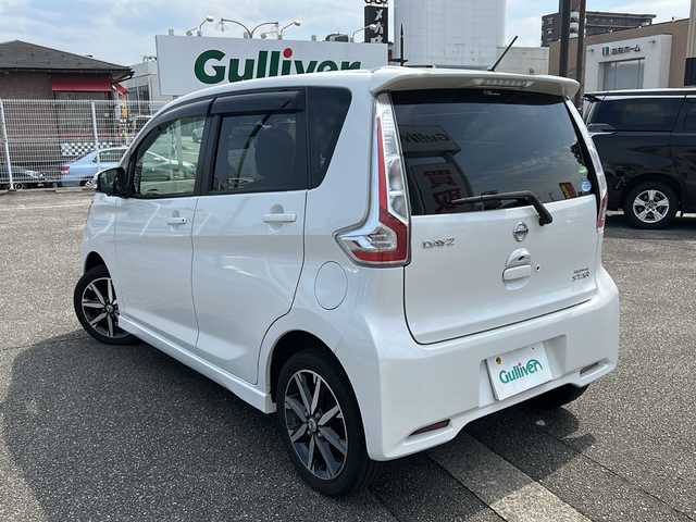 日産 デイズ ハイウェイスターG ターボ 富山県 2015(平27)年 4.5万km ホワイトパール スマートキー（２本）/4WD/衝突安全ブレーキ/全周囲モニター/純正メモリーナビ（MC315D-W）/フルセグTV/DVD再生/Bluetooth/純正15インチAW/シートヒーター（D席）/フォグランプ/純正ドアバイザー/フロアマット/横滑り防止装置/アイドリングストップ/電動格納ウィンカーミラー/ドライブレコーダー（前）/保証書/取扱説明書/ナビ取扱説明書/ドライブレコーダー取扱説明書/点検整備記録簿