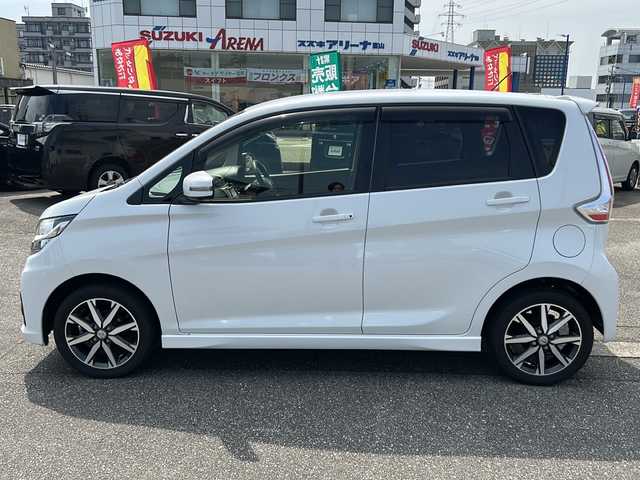日産 デイズ ハイウェイスターG ターボ 富山県 2015(平27)年 4.5万km ホワイトパール スマートキー（２本）/4WD/衝突安全ブレーキ/全周囲モニター/純正メモリーナビ（MC315D-W）/フルセグTV/DVD再生/Bluetooth/純正15インチAW/シートヒーター（D席）/フォグランプ/純正ドアバイザー/フロアマット/横滑り防止装置/アイドリングストップ/電動格納ウィンカーミラー/ドライブレコーダー（前）/保証書/取扱説明書/ナビ取扱説明書/ドライブレコーダー取扱説明書/点検整備記録簿