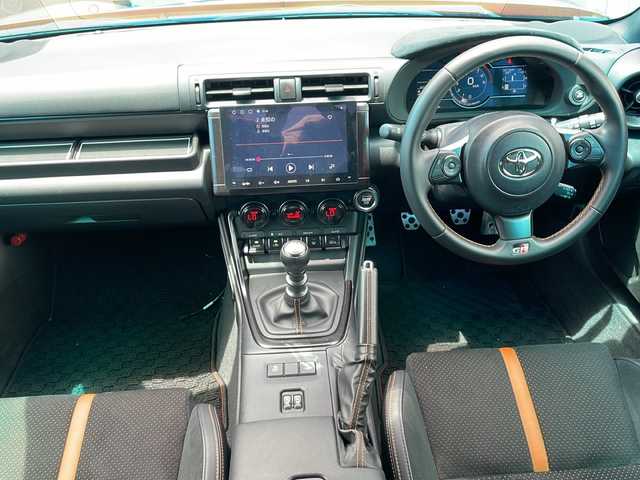 トヨタ ＧＲ８６ RZ 栃木県 2023(令5)年 1.2万km フレイムオレンジ 社外ディスプレイオーディオ/Bluetooth/無線接続/ATOTO A6/バックカメラ/ロッソモデロ　マフラー/社外車高調/クルーズコントロール/ハーフレザーシート/D/N席シートヒーター/GR専用革巻きステアリング/スマートキー/プッシュスタート/LEDヘッドライト/オートライト/社外フロアマット/電動格納ミラー/横滑り防止システム