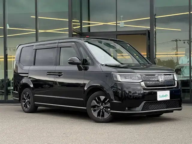 ホンダ ステップワゴン スパーダ 東京都 2023(令5)年 2.3万km クリスタルブラックパール Honda SENSING/・衝突軽減ブレーキ/・誤発進抑制機能/・路外逸脱抑制機能/・アダプティブクルーズコントロール/・車線維持支援システム/・先行車発進お知らせ機能/・ブラインドスポットインフォメーション/プッシュスタート/アイドリングストップ/パドルシフト/純正9インチナビ/フルセグTV/バックカメラ/ETC/ドライブレコーダー/両側パワースライドドア/パワーテールゲート/ハーフレザーシート/シートヒーター/シートバックテーブル/後席ロールサンシェード/オットマン/LEDヘッドライト/ドアバイザー/16インチ純正アルミホイール