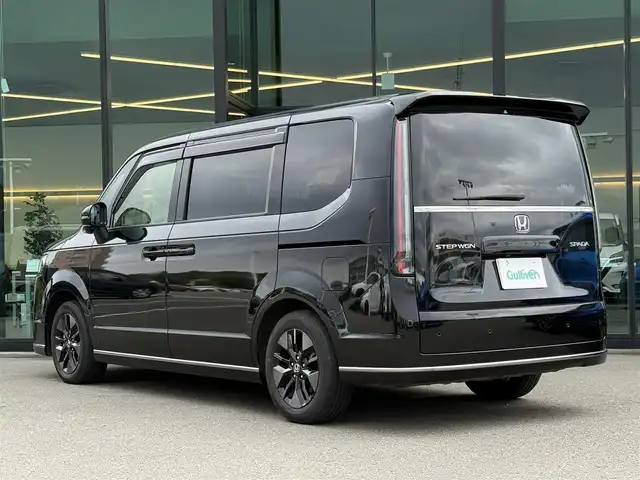 ホンダ ステップワゴン スパーダ 東京都 2023(令5)年 2.3万km クリスタルブラックパール Honda SENSING/・衝突軽減ブレーキ/・誤発進抑制機能/・路外逸脱抑制機能/・アダプティブクルーズコントロール/・車線維持支援システム/・先行車発進お知らせ機能/・ブラインドスポットインフォメーション/プッシュスタート/アイドリングストップ/パドルシフト/純正9インチナビ/フルセグTV/バックカメラ/ETC/ドライブレコーダー/両側パワースライドドア/パワーテールゲート/ハーフレザーシート/シートヒーター/シートバックテーブル/後席ロールサンシェード/オットマン/LEDヘッドライト/ドアバイザー/16インチ純正アルミホイール