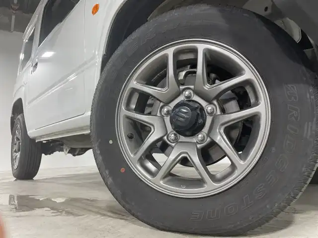 スズキ ジムニー XC 福岡県 2022(令4)年 2.5万km ピュアホワイトP 社外7型ナビ（AMFM/BT/iPod）/D/Nシートヒーター　/レーンキープアシスト　/アイドリングストップ　/ビルトインETC　/デュアルセンサーブレーキサポート　/横滑り防止装置　/衝突被害軽減システム　/クルーズコントロール