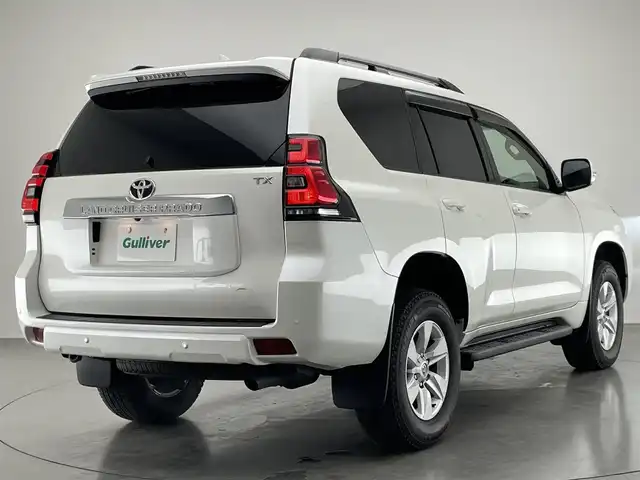 トヨタ ランドクルーザー プラド TX Lパッケージ 愛知県 2022(令4)年 0.9万km ホワイトパールクリスタルシャイン メーカーナビ　ムーンルーフ　ベージュ革シート　全方位カメラ　シートヒーター　前後ドラレコ　ＢＳＭ　ＥＴＣ２．０　セーフティセンス　衝突軽減　追従クルコン　コーナーセンサー　ＬＥＤオートライト　フォグ　TVキャンセラー　スペアタイヤ　純正フロアマット　ドアバイザー　ルーフレール　純正フロアマット