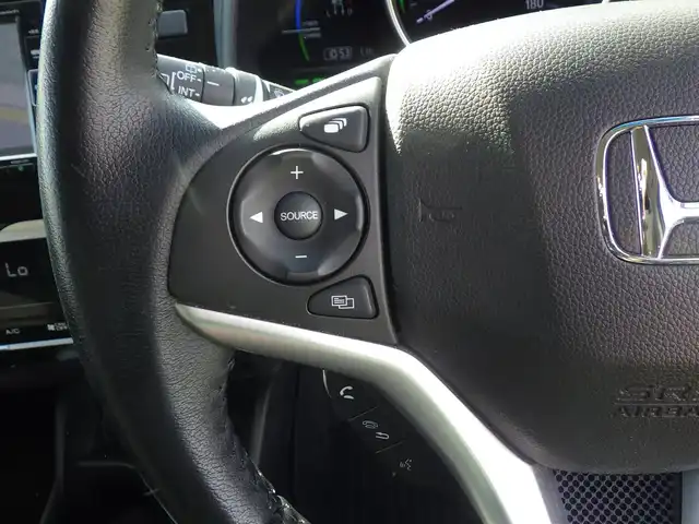 ホンダ フィット ハイブリット L ホンダセンシング 千葉県 2018(平30)年 1.9万km プラチナホワイトパール ホンダセンシング/・衝突軽減ブレーキ（CMBS）/・車線維持支援システム（LKAS）/・アダプティブクルーズコントロール（ACC）/・後方誤発進抑制機能/・誤発進抑制機能/ハーフレザーシート/純正メモリーナビ/地デジTV/【DVD/CD再生機能　Bluetooth接続】/バックカメラ/革巻きステアリング/ETC/LEDヘッドライト/フォグライト/ウインカーミラー/サイド/カーテンエアバッグ/Honda スマートキー