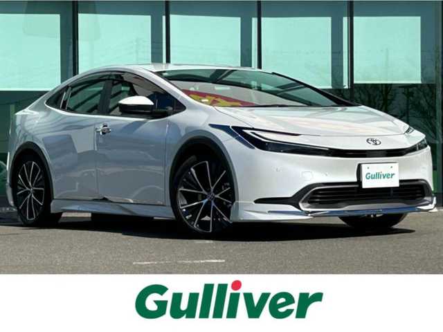 トヨタ プリウス G 和歌山県 2023(令5)年 1.2万km プラチナホワイトパールマイカ 純正8インチナビ機能付デイスプレーオーディオ/MODELLISTA製エアロ/バックカメラ/レーダークルーズコントロール/横滑り防止装置/衝突被害軽減システム/レーンキープ/シートヒーター/ETC2.0/前後ドライブレコーダー/前後コーナーセンサー/オートライト/LEDヘッドライト