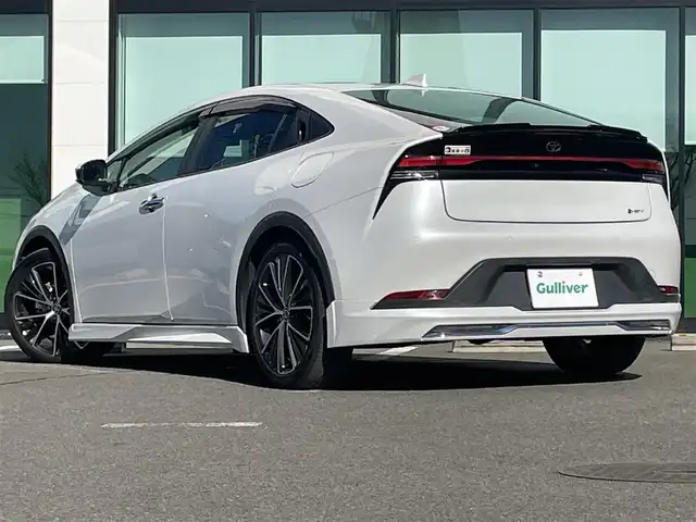 トヨタ プリウス G 和歌山県 2023(令5)年 1.2万km プラチナホワイトパールマイカ 純正8インチナビ機能付デイスプレーオーディオ/MODELLISTA製エアロ/バックカメラ/レーダークルーズコントロール/横滑り防止装置/衝突被害軽減システム/レーンキープ/シートヒーター/ETC2.0/前後ドライブレコーダー/前後コーナーセンサー/オートライト/LEDヘッドライト