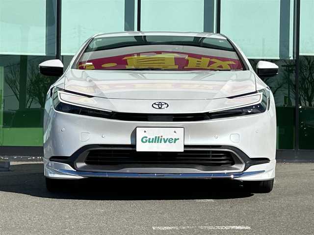 トヨタ プリウス G 和歌山県 2023(令5)年 1.2万km プラチナホワイトパールマイカ 純正8インチナビ機能付デイスプレーオーディオ/MODELLISTA製エアロ/バックカメラ/レーダークルーズコントロール/横滑り防止装置/衝突被害軽減システム/レーンキープ/シートヒーター/ETC2.0/前後ドライブレコーダー/前後コーナーセンサー/オートライト/LEDヘッドライト