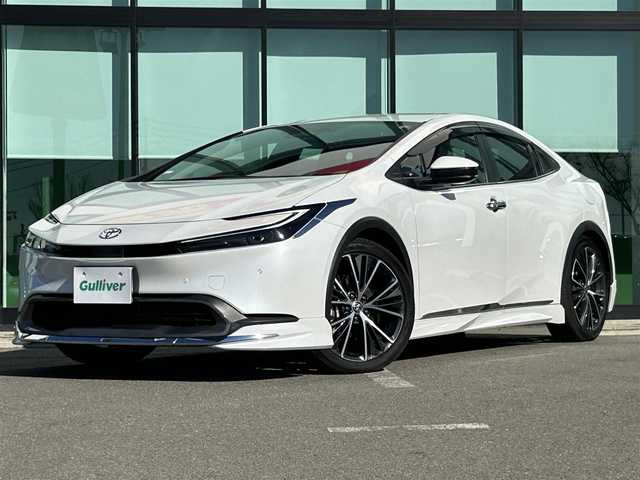 トヨタ プリウス G 和歌山県 2023(令5)年 1.2万km プラチナホワイトパールマイカ 純正8インチナビ機能付デイスプレーオーディオ/MODELLISTA製エアロ/バックカメラ/レーダークルーズコントロール/横滑り防止装置/衝突被害軽減システム/レーンキープ/シートヒーター/ETC2.0/前後ドライブレコーダー/前後コーナーセンサー/オートライト/LEDヘッドライト