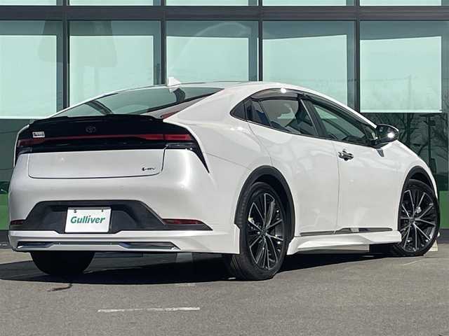 トヨタ プリウス G 和歌山県 2023(令5)年 1.2万km プラチナホワイトパールマイカ 純正8インチナビ機能付デイスプレーオーディオ/MODELLISTA製エアロ/バックカメラ/レーダークルーズコントロール/横滑り防止装置/衝突被害軽減システム/レーンキープ/シートヒーター/ETC2.0/前後ドライブレコーダー/前後コーナーセンサー/オートライト/LEDヘッドライト