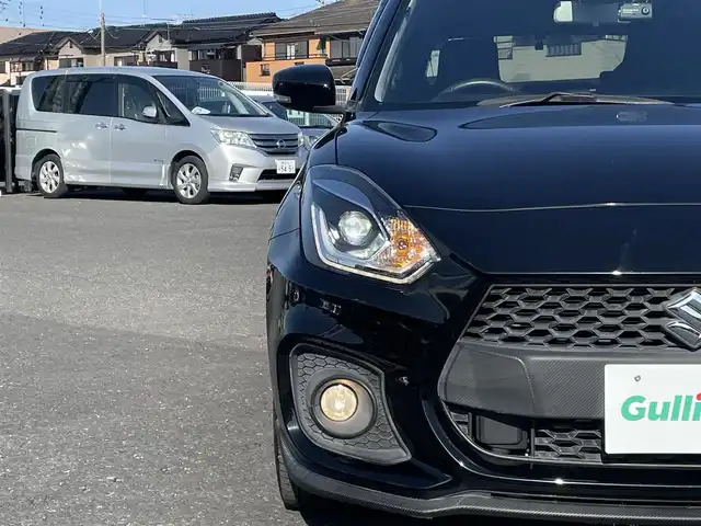 スズキ スイフト スポーツ 千葉県 2019(令1)年 1.3万km スーパーブラックパール ワンオーナー/HKSフラッシュエディター/HKSエアクリーナー＆ブローオフバルブ/モンスターカーボンウイング/モンスターマフラー/モンスターLSD/オイルキャッチタンク/純正8型SDナビ/フルセグTV（CN-RZ843）/前後ドラレコ/純正ビルトインETC/レーダークルーズコントロール/衝突軽減ブレーキ/レーンキープアシスト