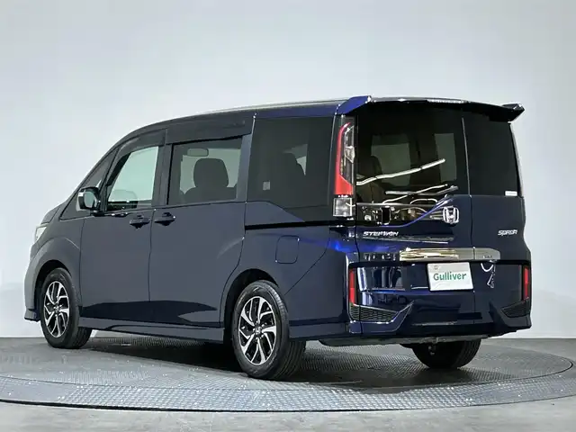 ホンダ ステップワゴン スパーダ ホンダセンシング 愛媛県 2021(令3)年 1.8万km オブシダンブルーパール 純正９インチナビ/（ＣＤ／ＤＶＤ／ＴＶ／ＢＴ）/両側パワスラ　/ホンダセンシング　/社外レーダー　/純正１６インチアルミ/バックカメラ　/前方ドラレコ　/スペアキー　/ＬＥＤライト/プッシュスタート