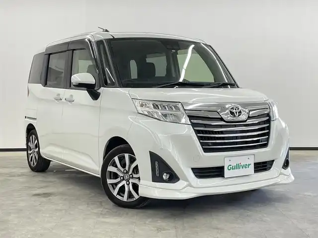 トヨタ ルーミー カスタムG－T 長崎県 2019(令1)年 4.6万km パールホワイトⅢ 社外8インチナビ　（AVIC‐RL710）/　フルセグTV　CD/DVD/Bluetooth/プリクラッシュセーフティ/横滑り防止/プッシュスタート/ステアリングスイッチ/クルーズコントロール/バックカメラ/コーナーセンサー/シートヒーター/ETC/アイドリングストップ/両側パワースライドドア/オートハイビーム/LEDヘッドライト/純正フロアマット/純正15インチAW