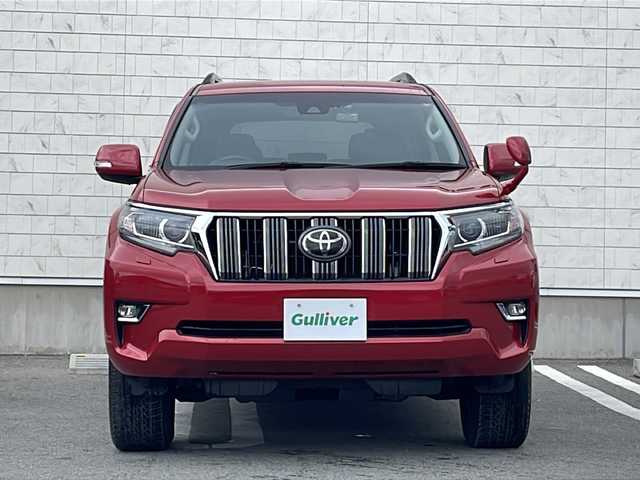 トヨタ ランドクルーザー プラド TX Lパッケージ 山形県 2020(令2)年 1.6万km レッドマイカメタリック 4WD/アルパイン9型ナビ(BT/CD/DVD)/フルセグTV/バックカメラ/ビルトインETC/アルパインドライブレコーダー/アルパイン10型リアビジョン/レーダークルーズコントロール/クリアランスソナー/セーフティセンス/・プリクラッシュセーフティシステム/・レーンディパーチャーアラート/・オートマチックハイビーム/LEDヘッドランプ/本革巻きステアリング/ステアリングスイッチ/ブラック革シート/前席パワーシート/快適温熱シート/純正17インチアルミホイール/スマートエントリー/スタートシステム/禁煙車