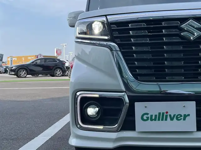 スズキ スペーシア カスタム HYBRID XS ターボ 香川県 2019(令1)年 5.6万km ピュアホワイトP 登録時走行距離：55501km/カロッツェリアナビ/　CD DVD BT　フルセグTV/バックカメラ/両側パワースライドドア/衝突被害軽減装置/レーンキープアシスト/クルーズコントロール/クリアランスソナー/横滑り防止装置/アイドリングストップ/ETC/ドライブレコーダー/ハーフレザーシート/シートヒーター/サンシェード/サーキュレータ/革巻きステアリング/スラアリングリモコン/パドルシフト/プッシュスタート/スマートキー