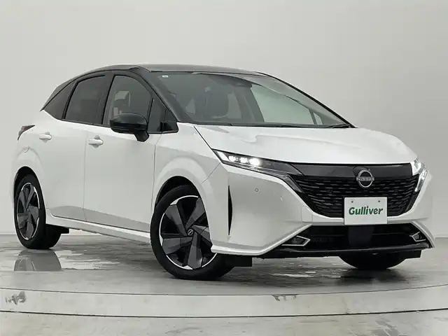 日産 オーラ G レザーエディション 宮城県 2023(令5)年 1.8万km ピュアホワイトパール / スーパーブラック 2トーン 純正９インチナビ　/(Bluetooth/フルセグTV/HDMI/CarPlay)/ＢＯＳＥサウンド　/プロパイロット　/ＳＯＳコール　/ワイヤレス充電　/ＥＴＣ２．０　/衝突軽減ブレーキ　/アラウンドビューモニター　/デジタルインナーミラー　/ドライブレコーダー　/オートブレーキホールド/LEDヘッドライト/オートハイビーム