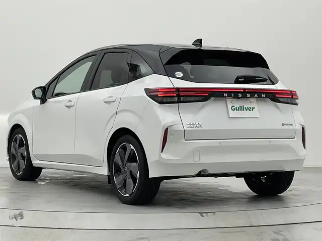 日産 オーラ G レザーエディション 宮城県 2023(令5)年 1.8万km ピュアホワイトパール / スーパーブラック 2トーン 純正９インチナビ　/(Bluetooth/フルセグTV/HDMI/CarPlay)/ＢＯＳＥサウンド　/プロパイロット　/ＳＯＳコール　/ワイヤレス充電　/ＥＴＣ２．０　/衝突軽減ブレーキ　/アラウンドビューモニター　/デジタルインナーミラー　/ドライブレコーダー　/オートブレーキホールド/LEDヘッドライト/オートハイビーム