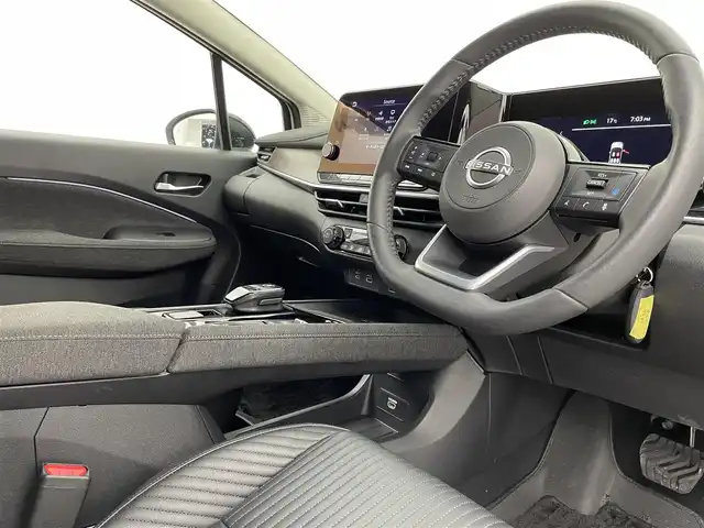 日産 オーラ G レザーエディション 宮城県 2023(令5)年 1.8万km ピュアホワイトパール / スーパーブラック 2トーン 純正９インチナビ　/(Bluetooth/フルセグTV/HDMI/CarPlay)/ＢＯＳＥサウンド　/プロパイロット　/ＳＯＳコール　/ワイヤレス充電　/ＥＴＣ２．０　/衝突軽減ブレーキ　/アラウンドビューモニター　/デジタルインナーミラー　/ドライブレコーダー　/オートブレーキホールド/LEDヘッドライト/オートハイビーム