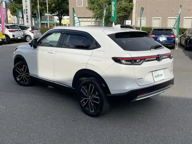 ホンダ ヴェゼル ハイブリッド e:HEV Z 鳥取県 2021(令3)年 2.6万km プラチナホワイトパール ホンダセンシング /ブラインドスポットインフォメーション/後退出庫サポート/ホンダコネクトディスプレイ/・フルセグ/・ナビ /・Bluetooth/ETC2.0車載器/ワイヤレス充電器/親水/ヒーテッドドアミラー/前席シートヒーター/パワーテールゲート（予約クローズ機能付き）/LEDシーケンシャルウィンカー/ハーフレザーシート/純正18AW/スマートキー/プッシュスタート/前後ドライブレコーダー /W&サイドエアバック/カーテンエアバック