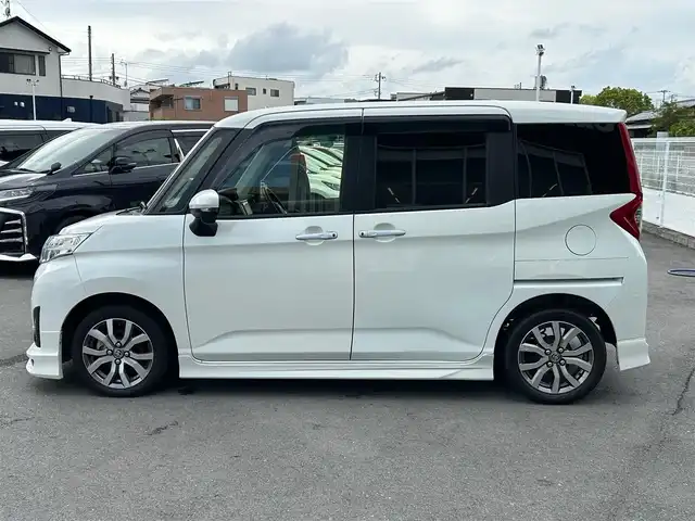 トヨタ ルーミー カスタムG－T 静岡県 2019(令1)年 4.4万km パール エンジンスタートボタン/パワーステアリング/パワーウィンドウ/アイドリングストップ/スマートキー/オートエアコン/クルーズコントロール/SDナビ（CD.DVD)/Bluetooth/SDミュージックサーバー/TV（フルセグ）/ETC/ウォークスルー/純正フロアマット/シートヒーター/両側パワースライドドア/エアロパーツ（モデリスタ）/純正アルミホイール/ABS/横滑り防止装置/コーナーセンサー前後/レーンキープアシスト/オートライト/オートマチックハイビーム/LEDライト/Wエアバッグ/衝突軽減システム