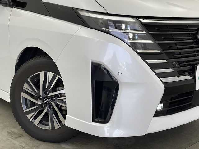 日産 セレナ ハイウェイスター V 新潟県 2023(令5)年 6.3万km プリズムホワイト メーカー純正メモリナビ/(フルセグ.AppleCarPlay.AndroidAuto.Bluetooth)/アラウンドビューモニター/エマージェンシーブレーキ/プロパイロット/ハンズフリー付両側パワースライドドア/LEDオートライト/ビルトインETC2.0/コーナーセンサー/Qiおくだけ充電/プッシュスタート/スマートキー/純正フロアマット
