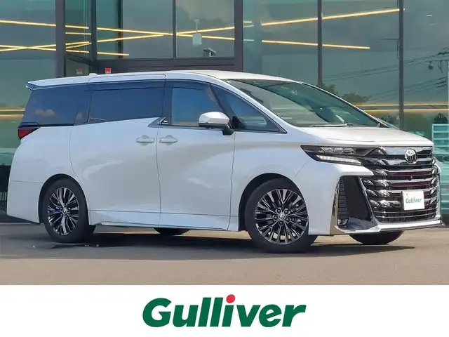 トヨタ ヴェルファイア ハイブリット Z プレミア 東京都 2023(令5)年 1.3万km プラチナホワイトパールマイカ 純正14インチディスプレイオーディオ/パノラミックビューモニター/純正13インチ後席ディスプレイ/トヨタチームメイト/アドバンストパーク/デジタルインナーミラー/左右独立ムーンルーフ/両側パワースライドドア/パワーバックドア/ヘッドアップディスプレイ/ビルトインETC2.0/ドライブレコーダー/シートヒーター/ベンチレーションシート/ステアリングヒーター/パドルシフト/AC100V/Toyota Safety Sense/プリクラッシュセーフティ/レーントレーシングアシスト/レーダークルーズコントロール/オートマチックハイビーム/クリアランスソナー