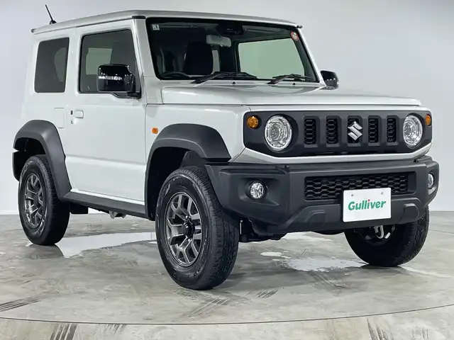 スズキ ジムニー シエラ JC 福岡県 2025(令7)年 0.1万km ピュアホワイトP 禁煙車社外7型SDナビ（Bluetooth/DVD/CD/AM/FM）バックモニター衝突軽減ブレーキクルコンコーナーセンサーアイドリングストップシートヒーター電格ミラースマートキープッシュスタート