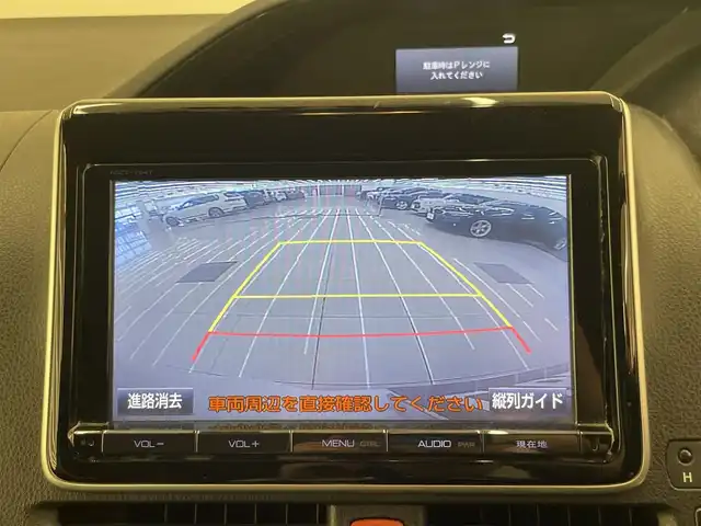 トヨタ エスクァイア ハイブリッド Gi 岡山県 2015(平27)年 10.7万km ホワイトパールクリスタルシャイン DOPナビ　NSZT-Y64T/フルセグTV（AM.FM.TV.CD.DVD.BT）/アルパインリアフリップダウンモニター/両側パワースライドドア/バックカメラ/ETC/ドライブレコーダー/レザーシート/シートヒーター/クルーズコントロール/オートライト/オートマチックハイビーム/フォグライト/サングラスホルダー/ステアリングスイッチ/ワイヤレス充電/ＬＥＤヘッドライト/スペアキー/15インチ純正AW/純正フロアマット