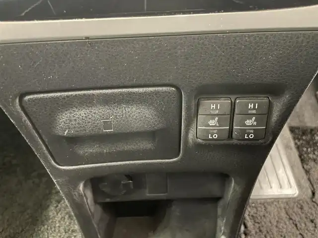 トヨタ エスクァイア ハイブリッド Gi 岡山県 2015(平27)年 10.7万km ホワイトパールクリスタルシャイン DOPナビ　NSZT-Y64T/フルセグTV（AM.FM.TV.CD.DVD.BT）/アルパインリアフリップダウンモニター/両側パワースライドドア/バックカメラ/ETC/ドライブレコーダー/レザーシート/シートヒーター/クルーズコントロール/オートライト/オートマチックハイビーム/フォグライト/サングラスホルダー/ステアリングスイッチ/ワイヤレス充電/ＬＥＤヘッドライト/スペアキー/15インチ純正AW/純正フロアマット