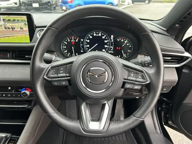 マツダ マツダ６セダン 25S Lパッケージ 愛媛県 2020(令2)年 3.5万km ジェットブラックマイカ 純正8型ナビ/全周囲カメラ/BOSEサウンドシステム＋11スピーカー/茶色レザーシート/全席シートヒーター/前席シートベンチレーション/前席パワーシート/運転席シートメモリー機能/ブラインドスポットモニター/追従機能付クルーズコントロール/ドライバーアテンションアラート/ヒル・ローンチ・アシスト/車線逸脱警報システム/AT誤発進抑制制御(前進/後退)/自動防眩ルームミラー/電動リアウインドウサンシェイド/本革巻ステアリング/ステアリングヒーター/電格ミラー/電動パーキングブレーキ/AutoHold機能/パドルシフト/現状サマー(純正ＡＷ)(235/40/R19)