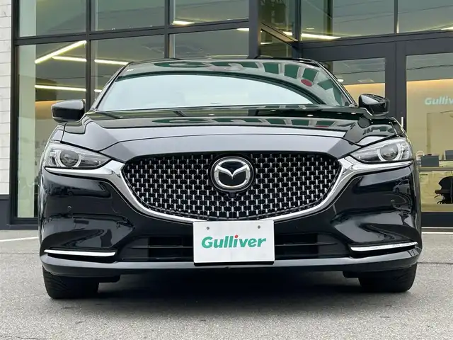 マツダ マツダ６セダン 25S Lパッケージ 愛媛県 2020(令2)年 3.5万km ジェットブラックマイカ 純正8型ナビ/全周囲カメラ/BOSEサウンドシステム＋11スピーカー/茶色レザーシート/全席シートヒーター/前席シートベンチレーション/前席パワーシート/運転席シートメモリー機能/ブラインドスポットモニター/追従機能付クルーズコントロール/ドライバーアテンションアラート/ヒル・ローンチ・アシスト/車線逸脱警報システム/AT誤発進抑制制御(前進/後退)/自動防眩ルームミラー/電動リアウインドウサンシェイド/本革巻ステアリング/ステアリングヒーター/電格ミラー/電動パーキングブレーキ/AutoHold機能/パドルシフト/現状サマー(純正ＡＷ)(235/40/R19)
