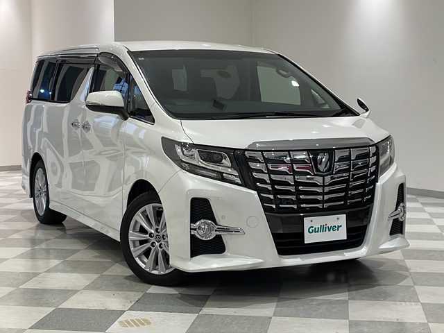 トヨタ アルファード S Aパッケージ 福井県 2015(平27)年 8.1万km ホワイトパールクリスタルシャイン 純正SDナビ/フルセグTV/BT/DVD/CD/SD/バックカメラ/フリップダウンモニター/ビルトインETC/前後ドライブレコーダー/クルーズコントロール/コーナーセンサー/両側パワースライドドア/デジタルインナーミラー/MTモード付AT/ウッドコンビステアリング/オートライト/LEDヘッドライト/純正18インチアルミホイール/プッシュスタート/スマートキー×2