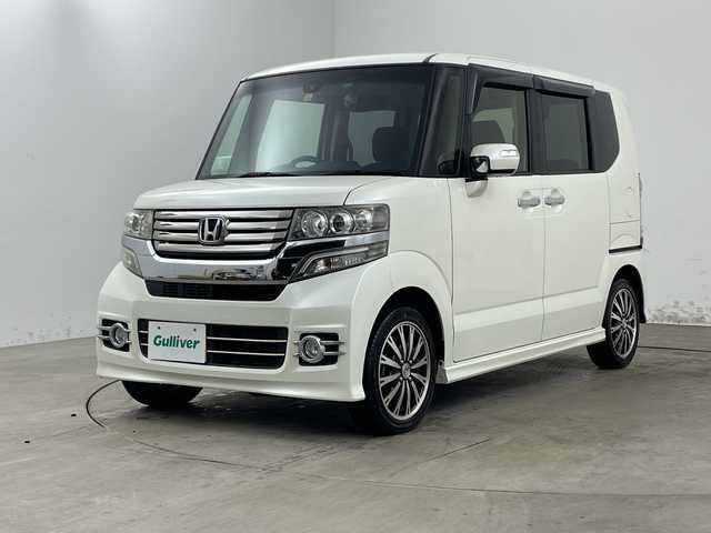 ホンダ Ｎ ＢＯＸ カスタム G ターボ Aパッケージ 兵庫県 2014(平26)年 9.2万km プレミアムホワイトパール ・純正8インチナビ/BT/CD/DVD/TV/USB/SD/・バックカメラ/・安心パッケージ/・シティブレーキアクティブシステム/・クルーズコントロール/・両側パワースライドドア/・横滑り防止装置/・ステアリングスイッチ/・パドルシフト/・前方ドライブレコーダー/・電動格納ミラー/・HIDヘッドライト/・フォグランプ/・純正16インチホイール/・スマートキー/・スペアキー/・取扱説明書/・保証書