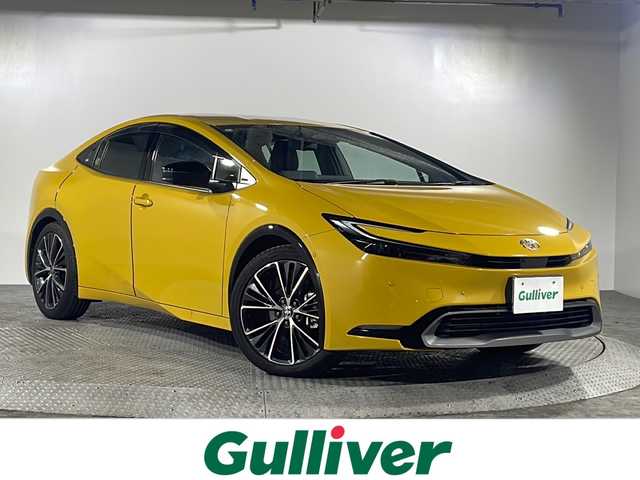 トヨタ プリウス Z 沖縄県 2024(令6)年 0.5万km 黄 禁煙車　/ワンオーナー　/純正１２．３インチナビ　/（フルセグＴＶ　Ｂｌｕｅｔｏｏｔｈ）　/全方位カメラ　/トヨタセーフティセンス/・PCS（プリクラッシュセーフティ）/・LDA（レーンディパーチャーアラート）/・AHB（オートマチックハイビーム）/BSM（ブラインドスポットモニター）　/PDA（プロアクティブドライビングアシスト）　/前後ドライブレコーダー　/ＥＴＣ２．０/レーダークルーズコントロール/レザーシート/メモリー付パワーシート/シートヒーター、エアシート/置くだけ充電/ステアリングヒーター