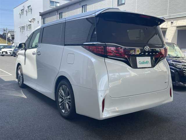 トヨタ アルファードハイブリット Z 愛知県 2025(令7)年 0.2万km プラチナホワイトパールマイカ ワンオーナー/左右独立パノラマルーフ＆電動シェード〈MOP〉/ユニバーサルステップ〈MOP〉/TOYOTAチームメイト〈MOP〉/・アドパンストパーク/・パーキングサポートブレーキ/・アドバンストドライブ/・フロントクロストラフィックアラート/・レーンチェンジアシスト/・ドライバーモニターカメラ/・パドルシフト/両側パワースライドドア/パワーバックドア/14インチディスプレイオーディオプラス/・車載ナビ／Bluetooth／HDMI/・地デジTV／Miracast/アラウンドビューカメラ/黒合皮シート/前席パワーシート/前席2列目シートヒーター＆ベンチレーション/2列目エグゼクティブパワーシート/デジタルインナーミラー/3眼LEDヘッドライト/フォグランプ/置くだけ充電/ビルトインETC2.0/TOYOTA Safety Sense/・プリクラッシュセーフティ/・レーントレーシングアシスト/・レーンディパーチャーアラート/・レーダークルーズコントロール/・アダプティブハイビーム/ブラインドスポットモニター/純正18インチAW