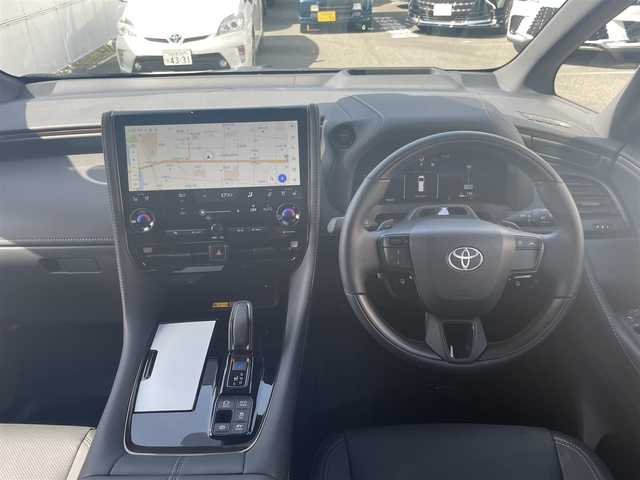 トヨタ アルファードハイブリット Z 愛知県 2025(令7)年 0.2万km プラチナホワイトパールマイカ ワンオーナー/左右独立パノラマルーフ＆電動シェード〈MOP〉/ユニバーサルステップ〈MOP〉/TOYOTAチームメイト〈MOP〉/・アドパンストパーク/・パーキングサポートブレーキ/・アドバンストドライブ/・フロントクロストラフィックアラート/・レーンチェンジアシスト/・ドライバーモニターカメラ/・パドルシフト/両側パワースライドドア/パワーバックドア/14インチディスプレイオーディオプラス/・車載ナビ／Bluetooth／HDMI/・地デジTV／Miracast/アラウンドビューカメラ/黒合皮シート/前席パワーシート/前席2列目シートヒーター＆ベンチレーション/2列目エグゼクティブパワーシート/デジタルインナーミラー/3眼LEDヘッドライト/フォグランプ/置くだけ充電/ビルトインETC2.0/TOYOTA Safety Sense/・プリクラッシュセーフティ/・レーントレーシングアシスト/・レーンディパーチャーアラート/・レーダークルーズコントロール/・アダプティブハイビーム/ブラインドスポットモニター/純正18インチAW