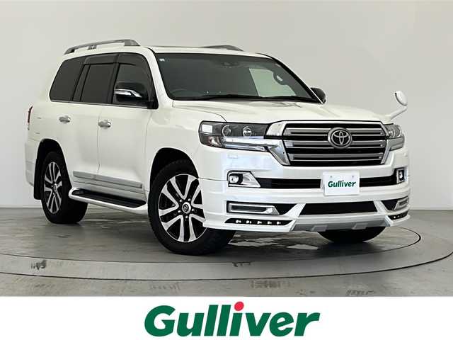 トヨタ ランドクルーザー ZX G－フロンティア 宮城県 2016(平28)年 0.6万km ホワイトパールクリスタルシャイン ４ＷＤ　/サンルーフ　/純正９インチナビ(CD/DVD/BT/フルセグTV/HDMI)/リヤシートエンターテインメント/WALDエアロ/2本出マフラー/ルーフレール/クールボックス　/バックカメラ　/前後コーナーセンサー　/トヨタセーフティセンス/　・プリクラッシュセーフティ/　・レーダークルーズコントロール/　・レーンディパーチャーアラート/　・ブラインドスポットモニター/　・オートマチックハイビーム/オートライト/LEDライト/ビルトインETC2.0/純正アルミホイール/パワーバックドア/フルエアロ/全席パワーシート/全席シートヒーター　/前席エアシート/シートメモリー/ステアリングヒーター/ステアリングスイッチ/純正フロアマット/レザーシート/レザーステアリング/サイドバイザー/禁煙車