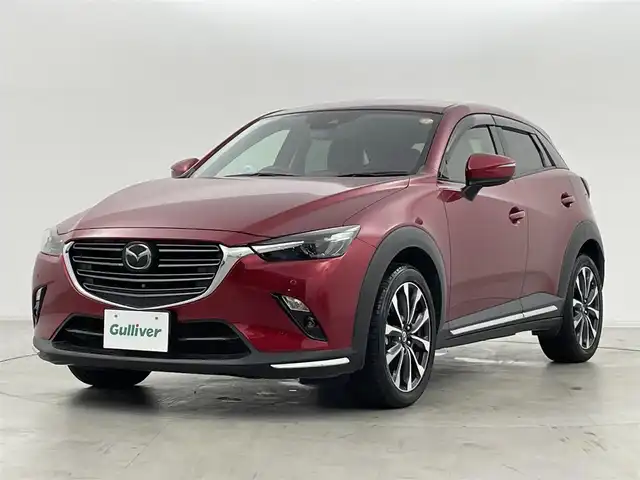マツダ ＣＸ－３ 20SプロアクティブSパッケージ 群馬県 2019(平31)年 2.4万km ソウルレッドクリスタルM 360°ビュー・モニター＋フロントパーキングセンサー/CD/DVDプレイヤー＋地上デジタルTVチューナー(フルセグ)/＝＝＝＝＝＝/純正7型ナビ/(AM/FM/Bluetooth/フルセグTV/CD/DVD/SD//USB1・2/AUX/AppleCarPlay/AndroidAuto)/ブラインドスポットモニタリング/クルーズコントロール/パドルシフト/ヘッドアップディスプレイ/ビルトインETC/運転席側パワーシート(ポジションメモリ付)/前席シートヒーター/ステアリングヒーター/電動パーキングブレーキ/オートブレーキホールド/プッシュスタート/スマートキー/スペアキー有