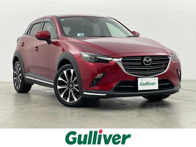 マツダ ＣＸ－３ 20SプロアクティブSパッケージ 群馬県 2019(平31)年 2.4万km ソウルレッドクリスタルM 360°ビュー・モニター＋フロントパーキングセンサー/CD/DVDプレイヤー＋地上デジタルTVチューナー(フルセグ)/＝＝＝＝＝＝/純正7型ナビ/(AM/FM/Bluetooth/フルセグTV/CD/DVD/SD//USB1・2/AUX/AppleCarPlay/AndroidAuto)/ブラインドスポットモニタリング/クルーズコントロール/パドルシフト/ヘッドアップディスプレイ/ビルトインETC/運転席側パワーシート(ポジションメモリ付)/前席シートヒーター/ステアリングヒーター/電動パーキングブレーキ/オートブレーキホールド/プッシュスタート/スマートキー/スペアキー有