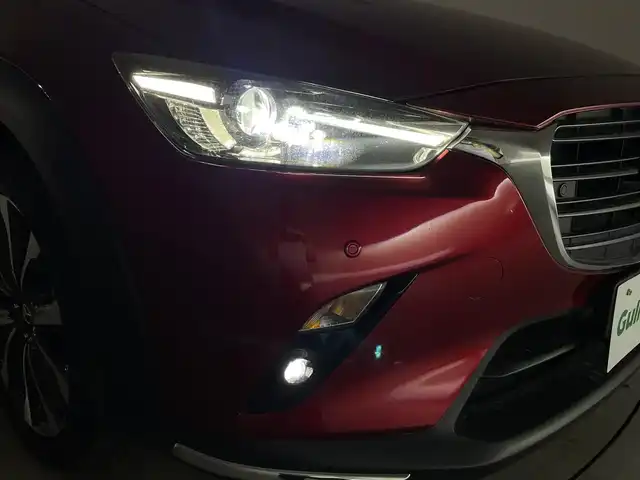 マツダ ＣＸ－３ 20SプロアクティブSパッケージ 群馬県 2019(平31)年 2.4万km ソウルレッドクリスタルM 360°ビュー・モニター＋フロントパーキングセンサー/CD/DVDプレイヤー＋地上デジタルTVチューナー(フルセグ)/＝＝＝＝＝＝/純正7型ナビ/(AM/FM/Bluetooth/フルセグTV/CD/DVD/SD//USB1・2/AUX/AppleCarPlay/AndroidAuto)/ブラインドスポットモニタリング/クルーズコントロール/パドルシフト/ヘッドアップディスプレイ/ビルトインETC/運転席側パワーシート(ポジションメモリ付)/前席シートヒーター/ステアリングヒーター/電動パーキングブレーキ/オートブレーキホールド/プッシュスタート/スマートキー/スペアキー有