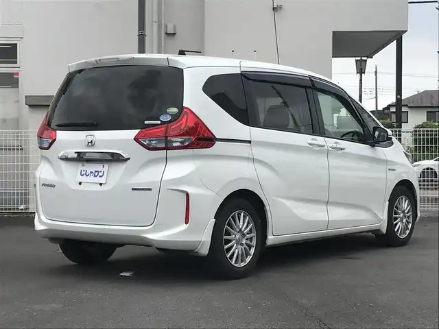 ホンダ フリード ハイブリット G ホンダセンシング 栃木県 2019(令1)年 14万km ホワイトオーキッドパール 株)IDOMが運営する【じしゃロン小山店】の自社ローン専用車両になります。こちらは現金またはオートローンご利用時の価格です。自社ローンご希望の方は別途その旨お申付け下さい//純正フルセグナビ/（CD/DVD/AM/FMラジオ）/(Bluetooth)/スマートキー/プッシュスタート/バックカメラ/クルーズコントロール/衝突軽減システム/レーンキープアシスト/ＥＴＣ/ステアリングリモコン/電動格納ドアミラー/パワーウインドウ/防眩ミラー/オートライト