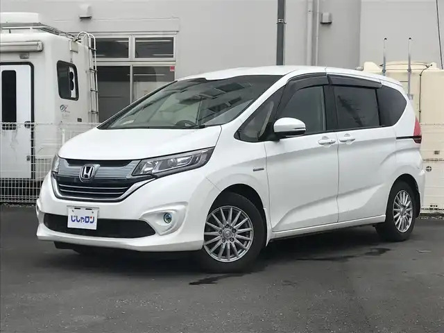 ホンダ フリード ハイブリット G ホンダセンシング 栃木県 2019(令1)年 14万km ホワイトオーキッドパール 株)IDOMが運営する【じしゃロン小山店】の自社ローン専用車両になります。こちらは現金またはオートローンご利用時の価格です。自社ローンご希望の方は別途その旨お申付け下さい//純正フルセグナビ/（CD/DVD/AM/FMラジオ）/(Bluetooth)/スマートキー/プッシュスタート/バックカメラ/クルーズコントロール/衝突軽減システム/レーンキープアシスト/ＥＴＣ/ステアリングリモコン/電動格納ドアミラー/パワーウインドウ/防眩ミラー/オートライト
