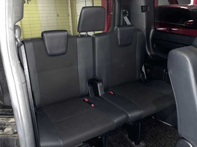 トヨタ ノア Si ダブルバイビー 静岡県 2018(平30)年 6.2万km ブラック 【安全装備】/トヨタセーフティセンス/プリクラッシュセーフティ/（レーザーレーダー・単眼カメラ方式）/（自車車速約30km/hから80km/h間：ブレーキアシスト機能発動）/（自車車速約10km/hから80km/h間踏力無時：約30km/h減速）/レーンディパーチャーアラート/（作動車速50km/h以上時）/オートマチックハイビーム/（作動車速30km/h以上時）/先行車発進お知らせ機能/【主要装備】/純正１０インチナビ　/後席フリップダウンモニター　/ハーフレザーシート　/両側パワースライドドア　/ビルトインＥＴＣ　/オートライト　/アイドリングストップ　/ＬＥＤヘッドライト　/クルーズコントロール　/プッシュスタート/スマートキー/純正16インチアルミホイール