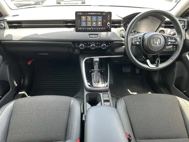 ホンダ ヴェゼル ハイブリッド e:HEV Z 静岡県 2023(令5)年 1.4万km クリスタルブラックパール ホンダセンシング/純正ディスプレイオーディオ/(AM/FM/BT/Applecarplay/androidauto)/フルセグTV/バックカメラ/ビルトインETC2.0/レーダークルーズコントロール/ハーフレザーシート/前席シートヒーター/ステアリングヒーター/パワーバックドア/前後コーナーセンサー/衝突被害軽減システム/横滑り防止装置/レーンキープアシスト/盗難防止装置/電動パーキングブレーキ/オートホールド/LEDヘッドライト/シーケンシャルターンランプ/オートマチックハイビーム/左右独立フルオートエアコン/そよ風アウトレット/スマートキー/プッシュスタート