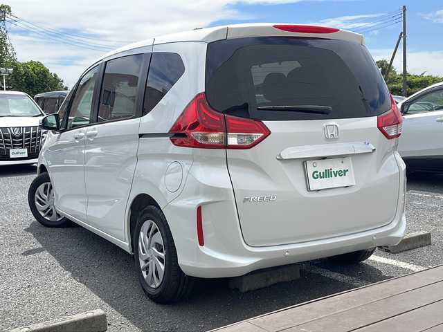 ホンダ フリード G 千葉県 2023(令5)年 0.4万km プラチナホワイトパール ナビＡＶＩＣ－ＲＺ５１１　バックカメラ　両側パワースライドドア　ドラレコ　ＥＴＣ　ホンダセンシング　レーダークルーズ　コンフォートビューパッケージ　ＬＥＤライト　オートライト　オートリトラミラー