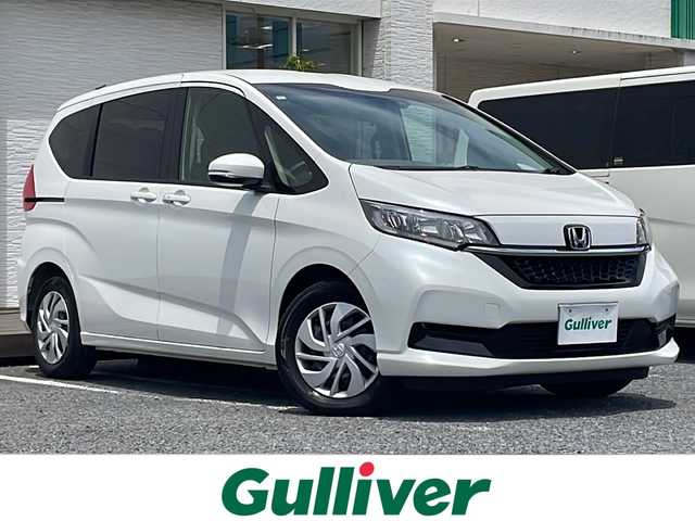 ホンダ フリード G 千葉県 2023(令5)年 0.4万km プラチナホワイトパール ナビＡＶＩＣ－ＲＺ５１１　バックカメラ　両側パワースライドドア　ドラレコ　ＥＴＣ　ホンダセンシング　レーダークルーズ　コンフォートビューパッケージ　ＬＥＤライト　オートライト　オートリトラミラー