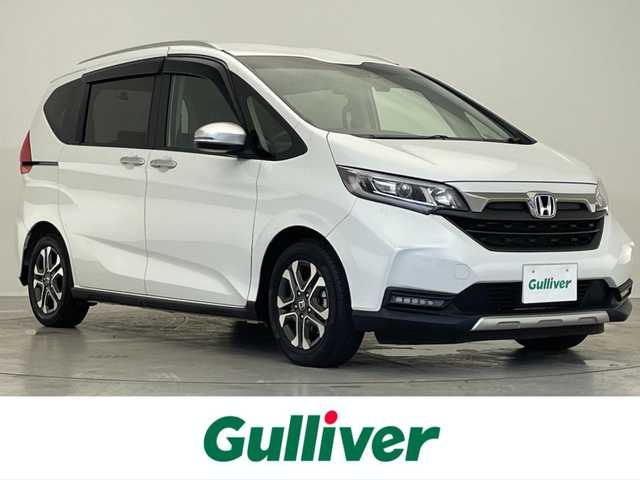 ホンダ フリード＋ クロスター 滋賀県 2023(令5)年 2万km プラチナホワイトパール 禁煙車/純正ナビ/CD/Bluetooth/FM/AM/SD/ipod/USB/バックカメラ/両側パワースライドドア/衝突軽減ブレーキ/アダプティブ・クルーズ・コントロール/車線維持支援システム/ETC/ハーフレザーシート/D/N席シートヒーター /前後ドライブレコーダー/LEDヘッドライト/オートライト/アイドリングストップ/ドアバイザー/プッシュスタート /スマートキー/電格ミラー